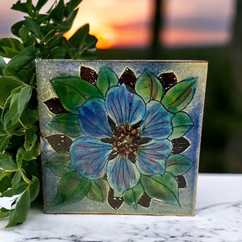 Beautifully hand painted ceramic tile with flower design. Made in England
